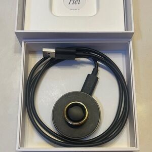 Oura Black and Gold Ring